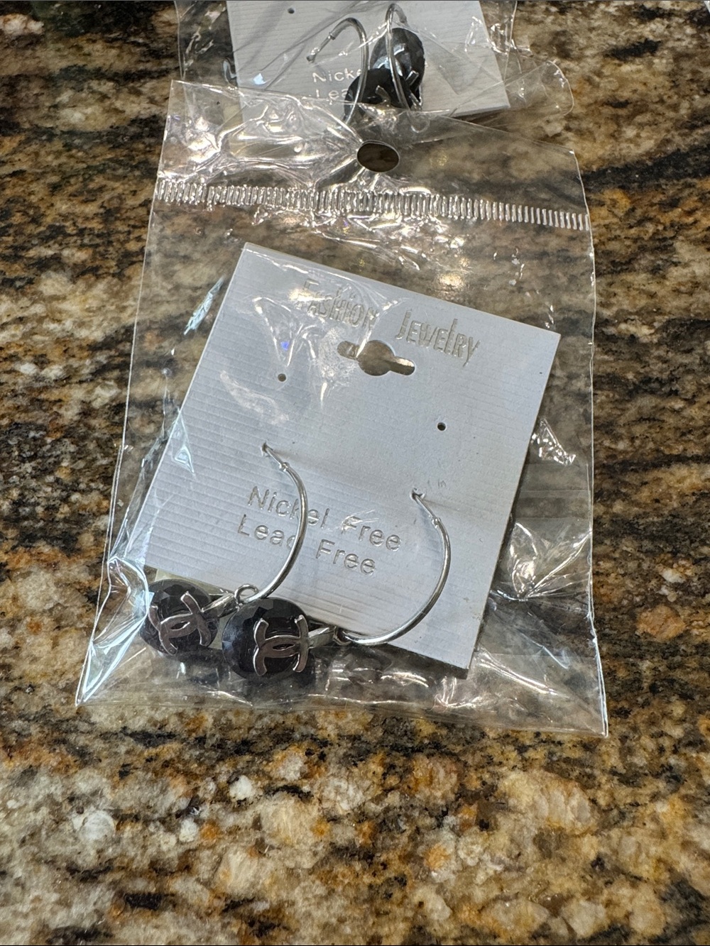 Silver Hoop Earrings with Black Logo Charms